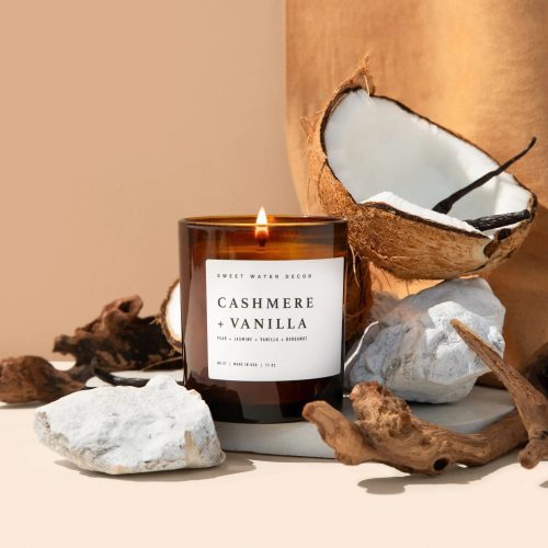 C057AW CASHMERE AND VANILLA 11OZ AMBER CANDLE SOONA R5 JULY 2023 SWEET WATER DECOR 1 299849